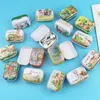 12 pezzi/lottp portatile mini scatola di latta di metallo stampa di modelli multipli mac trucco gioielli stoccaggio pillola con coperchio confezione regalo 210914
