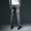 Мужские тощие белые джинсы мода повседневные эластичные хлопковые тонкие джинсовые штаны мужской бренд одежда черный серый Khaki 210716