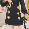 EWQ vintage preto alta cintura meia corpo acima de botões de flor de joelho A-line saia mulheres moda primavera verão 2f0323 210510
