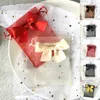 أكياس الأورجانزا السارية أكياس التخزين الإبداعية مع القوس لتعبئة المجوهرات عرض هدية عيد ميلاد الحلوى التفاف بالجملة