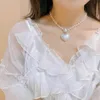 Collier de perles de tempérament pour femmes, élégant, doux, noël avant Halloween, offre spéciale, chaîne de pull rose en viande, Anime, nouvelle collection 2022