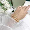 2020 New Hot Brand Pure 925 Sterling Silver Jewelry for Women Gold Clover Bracety Praty Wedding Jewelryゴールドフラワーカフバングル