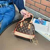 Moda niñas bolsos impresos padres niños floral mini portátil accesorios de concha mensajero bolsa niños mujeres cadena un hombro bolsos F137