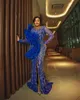 Królewskie niebieskie sukienki z koralikami Surowe Surowaj długie rękawy Seksowne przednie dzielone suknie imprezowe afrykańskie konkursy dla arabskich kobiet