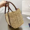 Designer de luxe Femmes Sacs de soirée Mode Ficelle Paille Sac fourre-tout Shopping Sacs à main classique Triangulaire Lady Sunshine Knitting Beach