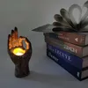 Titulares de vela Buda Hand tither Resina Buddhism Mudra Stand Tabletop Tealight Rack Decoração Home Desktop Artes Artesanatos Ornamentos