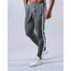 Pantalons pour hommes 2021 Jogger Hommes Pantalons de survêtement de haute qualité Coton Courir Sport Pantalon de jogging Mode Rayé Gym Fitness Entraînement