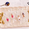 Scatola portaoggetti trasparente per trucco a forma di caramella Mini borsa portatile per orecchini, anello, borsa per gioielli, custodia per cosmetici da viaggio