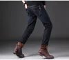 Jeans pour hommes 2021 Hommes d'hiver plus velours épaissie jeunesse mince élastique casual pantalon chaud pieds pieds mâles