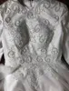 Слоновая кость мусульманский хиджаб свадебные платья платья с пособиями жемчуга с бисером кружева аппликации длинные арабские Дубай исламские свадебные платья на заказ плюс размер свадебного платья
