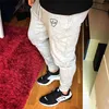 Mäns kvalitetsmärke män byxor fitness casual elastiska byxor bodybuilding kläder casual gym träning sweatpants joggare byxor y0927