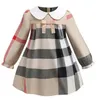 デザイナー服女の子のドレス夏の幼児のノースリーブの綿の赤ちゃんキッズの大きな格子縞の弓マルチカラー