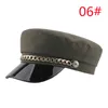 Bottone a catena in metallo Berretto in pelle nera PU Cappelli blu scuro Berretti piatti alla moda