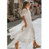 Évider robe blanche Sexy femmes longue dentelle croix Semi-transparent plongeant col en v manches courtes Maxi Y0823