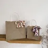 Gift Wrap Wholes 100pcs Lot Custom Jute Bags With Handles Reusabla And Recycled Tote Bag Bow For Shopping Gifts Customized L290S