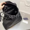 Hochwertiger Rucksack Unisex 2022 Luxury School Bag Designer Männer Black Rucksacks mittlere Mode mit dreieckigen Frauen'3151