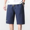 Zomer nieuwe mannen effen kleur shorts jeugd losse rechte casual vijfpuntige broek pure katoenen mode sportbroek x0705