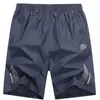 Pantalones cortos deportivos hombres verano casual fitness playa hombre transpirable gimnasio corto 4xl 5xl 6xl 210713