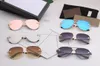 Solglasögon för män och kvinnor sommarstil 2201 Anti-ultraviolett retroplatta Pilot full ram mode slumpmässig låda
