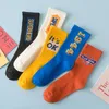 Hommes et femmes mode coton lettre chaussettes Couples originaux unisexe Hiphop drôle Streetwear sport respirant Skateboard Sox à la mode