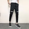 Printemps été coréen Slim Fit étiré Harem pantalon hommes vêtements 2021 Simple cheville longueur décontracté Joggers rayé pantalon 36 hommes