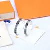 Designers Braceletes Moda Charme Bangle Jóias de Alta Qualidade Clássico Esmalte Homens Pulseira Não Desvanecimento Abertura Ajustável Jóias Presente Para Homens e Mulheres Estilo Nice