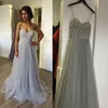 Long Prom Dresses Bling Bling Major Beading Crystal Sleeveless Spaghetti Straps Evening Gowns Silver Tulle Dress