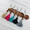 FedEx Partihandel Trä Beaded Keychain Party Favor Tassel Round Wooden Chips KeyRing DIY Monogrammed Bil Pendant Festival Party Present