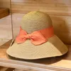 Vrouwen Elegante Bowknot Straw Hat Outdoor Strand UV Sun Protection Cap Solid Color Reizen Casual Casp Classic Brede Brav Hoeden