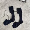 Chaussettes bonneterie filles coupe ruban bas sport loisirs dessiner corde rue personnalité noir et blanc coton en jambe haute