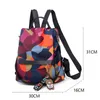 Sac à dos pour femmes à imprimé géométrique coloré Version simple sac d'école pour fille en nylon polyester sacs à dos