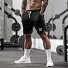 Muscleguys 남자 비치 반바지 보드 트렁크 반바지 메쉬 빠른 건조 남성 수영복 수영복 버뮤다 캐주얼 체육관 활성 스웨트 팬츠 210421