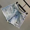 Deat Denim Shorts女性の細い綿のゆるい粗い端ホットドリルホールワイドレッグホットパンツ新しいファッション潮の夏GD887 210428
