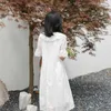 Frauen Elegantes gesticktes Spitzenkleid weißes weibliches Spleißen Blumen aushöhlen lose beiläufige Partei Vestidos 210520