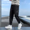 Hip Hop Jogadores Homens Preto Harem Calças Multi-Pocket Fita Outono Homem Sweetpants Streetwear Casual Mens Calças Y0927