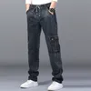 Calça jeans de cintura alta masculina em linha reta grande tamanho jantar calça masculina preto jeans laterais multi bolso azul solto elástico banda de carga 211104