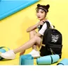 حقيبة الظهر USB Hip Hop للسيدات قبالة الأزياء الأزياء البيضاء جودة عالية السعة طلاب حقيبة حقيبة سفر غير رسمية على الظهر 287H