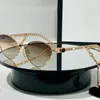 Lunettes de soleil Frame métallique Cat Eye Femmes avec des charmes en forme de coeur Fashion Style Lady Eyewear1101288