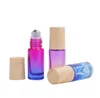 500 stks / partij 5 ml gradiënt kleur roll-on parfum essentiële olie fles stalen metalen roller balflessen met hout ziet eruit plastic cap SN4357