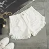 Moda Lato Kobiety White Denim Spodenki Sexy Dziura Ripped Mini Jeans Streetwear Tassel Wysoka talia 210714