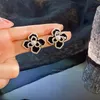 Fashion women's earrings flower shape 2021 popular alloy material inlaid natural pearl exquisite jewelry best gift