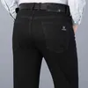 Autumn New Men S Pure Black Business Dżinsy Klasyczne styl regularne dżinsowe spodnie dżins