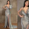 2021 Sexy Silver High Side Split Long Sleeves Evening Dresses Wear Illusion Crystal Beading Mermaid Floor Length Party Dress Prom Gowns Open Back Robes De Soirée