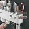 Magnetisk adsorption Inverterad tandborstehållare Dubbel automatisk tandkräm Squeezer Dispenser Storage Rack Badrum Tillbehör