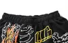 Shorts pour hommes Design Shorts flamme Graffiti décontracté mode pantalons de sport amples dans le monde entier