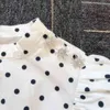 Camicetta a pois Donna Peter Pan Camicie Summer Fashion Puff manica corta Blusas Mujer De Moda Stand Collar Donna Top 210514