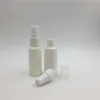 100セット30ml / 1oz HDPE空の白いプラスチック香水びんの詰め替え噴霧器のびん