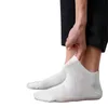 Calcetines de hombre Casual Color sólido Malla Barco Transpirable Invisible Boca baja Zapatos de guisantes de silicona