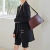 Blazer noir femmes mode vêtements d'extérieur longs printemps automne à manches longues décontracté poches lâches manteau irrégulier vêtements d'extérieur pour femmes hauts 210417