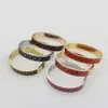 Europa America Fashion Brand Jewelry Lady Donna Acciaio inossidabile Nero Rosso Smalto Inciso Lettera Bracciale rigido in oro 18 carati 3 colori